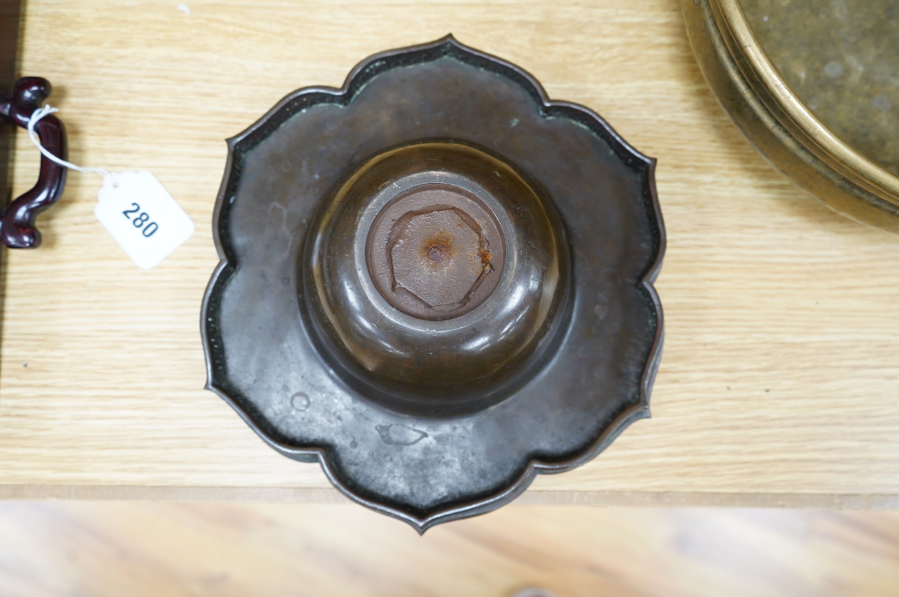 A Chinese bronze lotus dish with reticulated border, 27cm diameter, and a bronze two handled bowl, 29cm diameter. Condition - fair